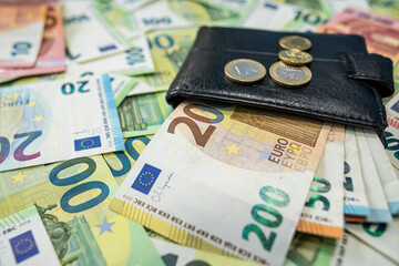 Euro cash and coins symbol of european currency and economy