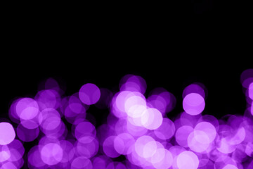 Vibrant purple bokeh bubbles rise along the bottom over pure black, delivering a modern festive background for Christmas, New Year, web banners, invitations, and overlays. © Katerina