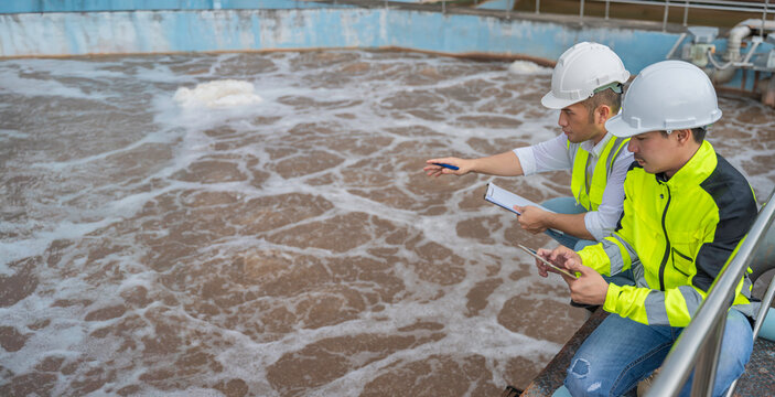Environmental engineers work at wastewater treatment plants,Water supply engineering working at Water recycling plant for reuse