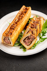 Fototapeta premium pate en crout in pastry natural baking healthy food main course ingredient appetizer fresh tasty table setting gourmet food background on the table rustic food top view 