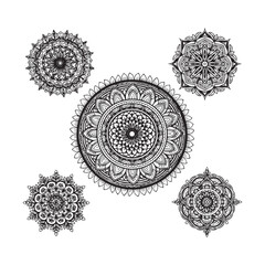 Geometric mandala design with delicate floral elements and subtle color palette.