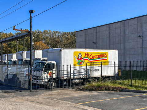 Mi Costenita food distribution trucks outside of the distribution warehouse. Alsip, IL USA October 26, 2025
