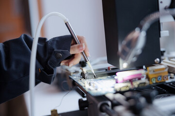 Precision craftsmanship in electronic circuit design at a modern technology workshop