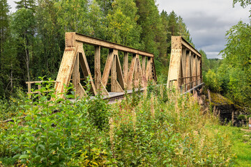 Old abandoned railway bridge in Swedish Lapland forest