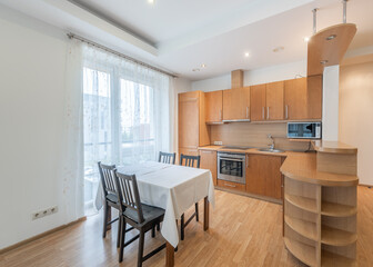 Modern Home Apartment Open-Plan Kitchen and Dining Area with Natural Light