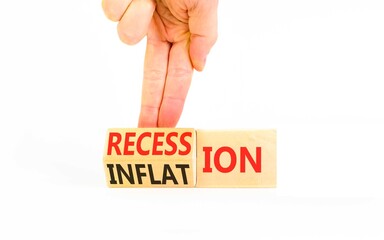 Inflation recession symbol. Concept words Recession to Inflation on beautiful wooden cubes. Beautiful white background. Businessman's hand. Business and inflation or recession concept. Copy space.