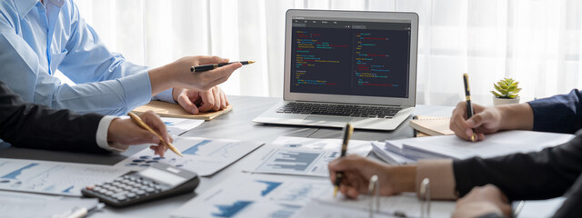 Business intelligence and data analysis concept. Analyst team working on financial data analysis...