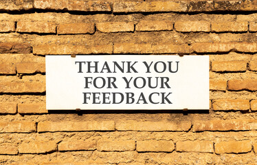 Thank you for your feedback symbol. Concept words Thank you for your feedback on white marble sign...