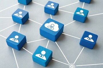 Blue cubes with human icons and a cloud icon connected by lines, symbolizing cloud computing, networking, and data management.