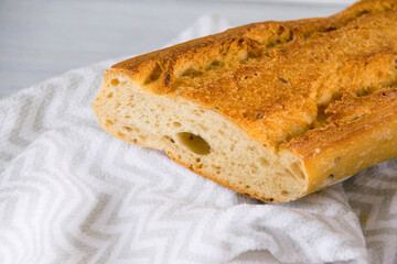 Fragrant baguette with sesame and buckwheat flour. Healthy bread for breakfast