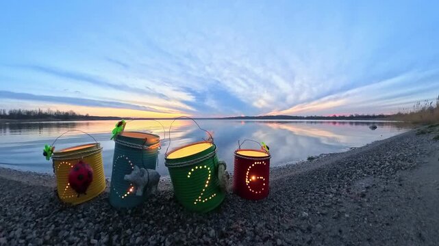 colorful lantern happy new year tin cans at the beach