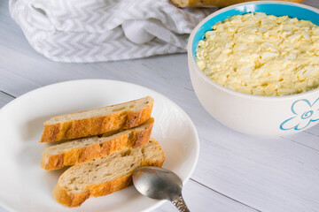 Whole grain baguette made from buckwheat flour and sesame seeds, and salad with egg