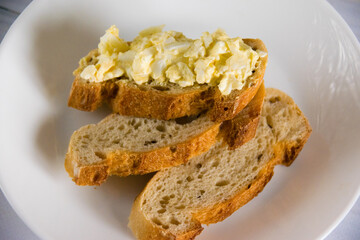 Sandwich with egg and delicious whole grain baguette with sesame seeds. Nutritious breakfast concept