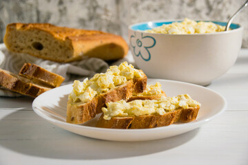 Sandwich with egg and delicious whole grain baguette with sesame seeds. Nutritious breakfast concept