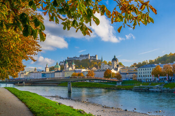City of Salzburg with Salzach River and Fortress Hochensalzburg in the fall season.