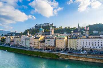Naklejka premium City of Salzburg with Salzach River and Fortress Hochensalzburg in the fall season.