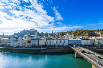 City of Salzburg with Salzach River and Fortress Hochensalzburg in the fall season.