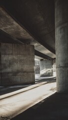 Naklejka premium Urban Overpass View with Strong Concrete Textures and Shadows