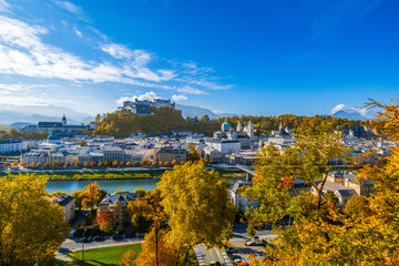 City of Salzburg with Salzach River and Fortress Hochensalzburg in the fall season.
