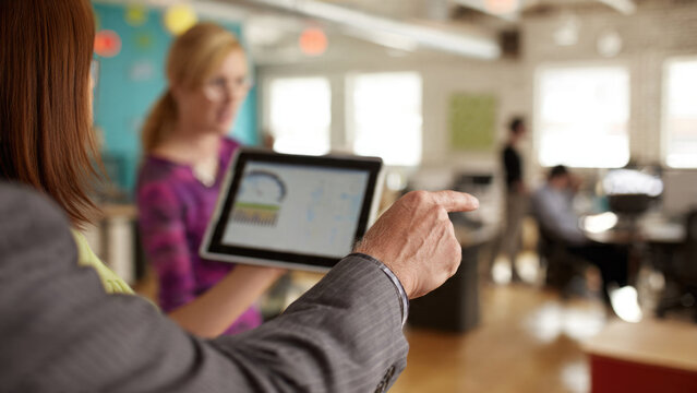 Business Meeting with Tablet - Powered by Adobe