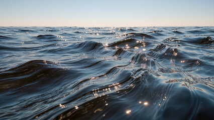 A realistic stock photo of a deep blue sea surface in a close-up view. Rhythmic waves create an intricate texture, while the low sun reflects on the crests, forming bright golden sparks and glints. Th