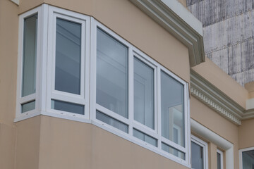 Modern bay window on building facade architecture
