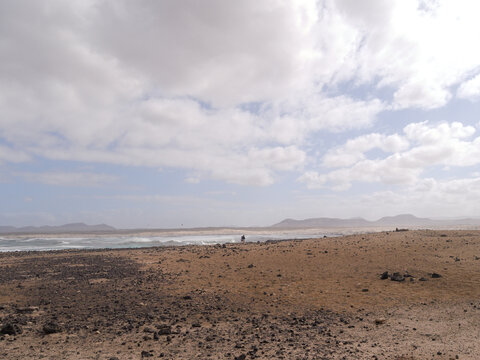 El Cotillo village - Fuerteventura island - Spain - December 4 2025 : Dramatic view of beautiful desert landscape, rugged coastline  and beach.