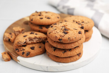 Delicious chocolate chip cookies on light table, closeup