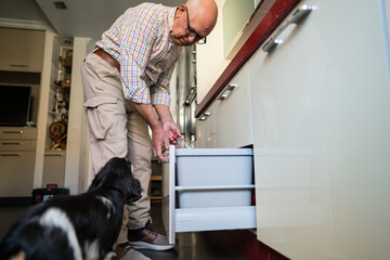 Senior man engaged in eco-friendly recycling routine