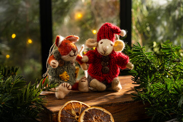 Festive toys with dried oranges and pine branches
