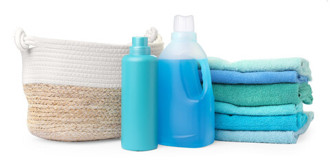 Laundry basket with towels and bottles of detergent isolated on white
