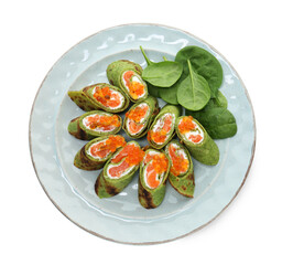 Tasty spinach crepes with salmon, cream cheese, red caviar and leaves isolated on white, top view