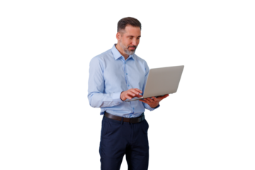 Businessman standing and working on laptop, managing online business, a professional using technology