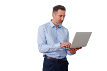Professional businessman standing and working on a laptop, concentrating and typing, transparent background