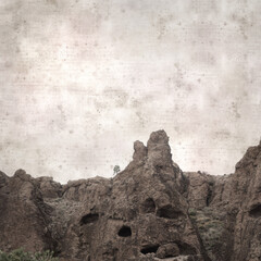 textured stylish old paper background, square, with landscape of central Gran Canaria, route to Ventana de Bentayga