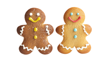 Two gingerbread men are smiling and looking at the camera