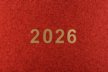N&uacute;meros de a&ntilde;o nuevo de 2026 sobre fondo rojo, dorado y gris