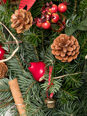 natural spruce branches decorated with pine cones