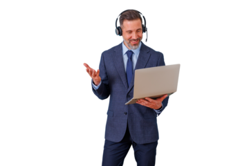 Professional man participating in a video call with laptop and headphones, standing while communicating remotely