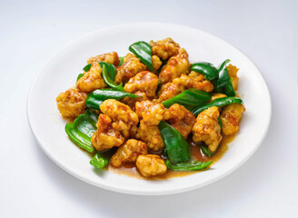 Delicious Kung Pao chicken dish with crispy chicken and green peppers