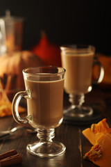 Glasses with warm pumpkin latte	