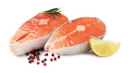 Pieces of salmon fillet with spices and lemon isolated on white