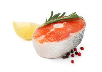 Piece of salmon fillet with spices and lemon isolated on white