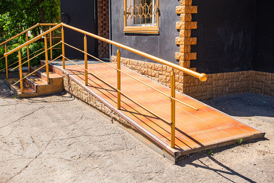 a poor ramp for people with disabilities to enter a building that does not perform its intended function; corruption in construction; and improper repair work