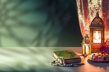 Iftar fast-breaking evening meal of Muslims in Ramadan at the time of adhan. Quran Book, Arabic lantern for Muslim holy month Ramazan Kareem. Decorative Holiday lamp
