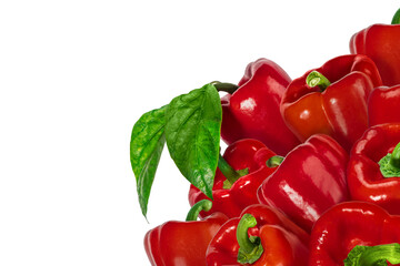 Corner of fresh red bell peppers with stems and one with a green leaf, isolated on transparent background. Fresh vegetable with green stem, perfect for healthy food, cooking, design concepts.