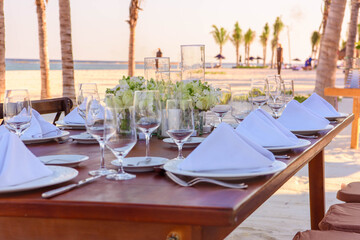 Elegant Outdoor Dining Setup with Floral Centerpiece