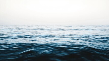 Obraz premium Tranquil ocean surface with soft light and flowing water abstract