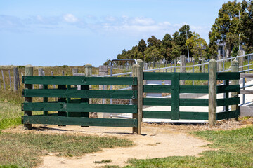 Timber gate in Point Cook, Melbourne, designed to control animal access and protect creek and wetland areas within suburban public land. Commonly used for environmental management