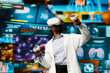Researcher analyzing human anatomy using VR headset equipment in front of digital health dashboards backdrop. Scientist using virtual reality technology to analyze medical scans